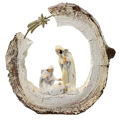 nativite stylisee sur tronc avec comete resine 20 cm